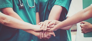 Medical team hands together 142380419